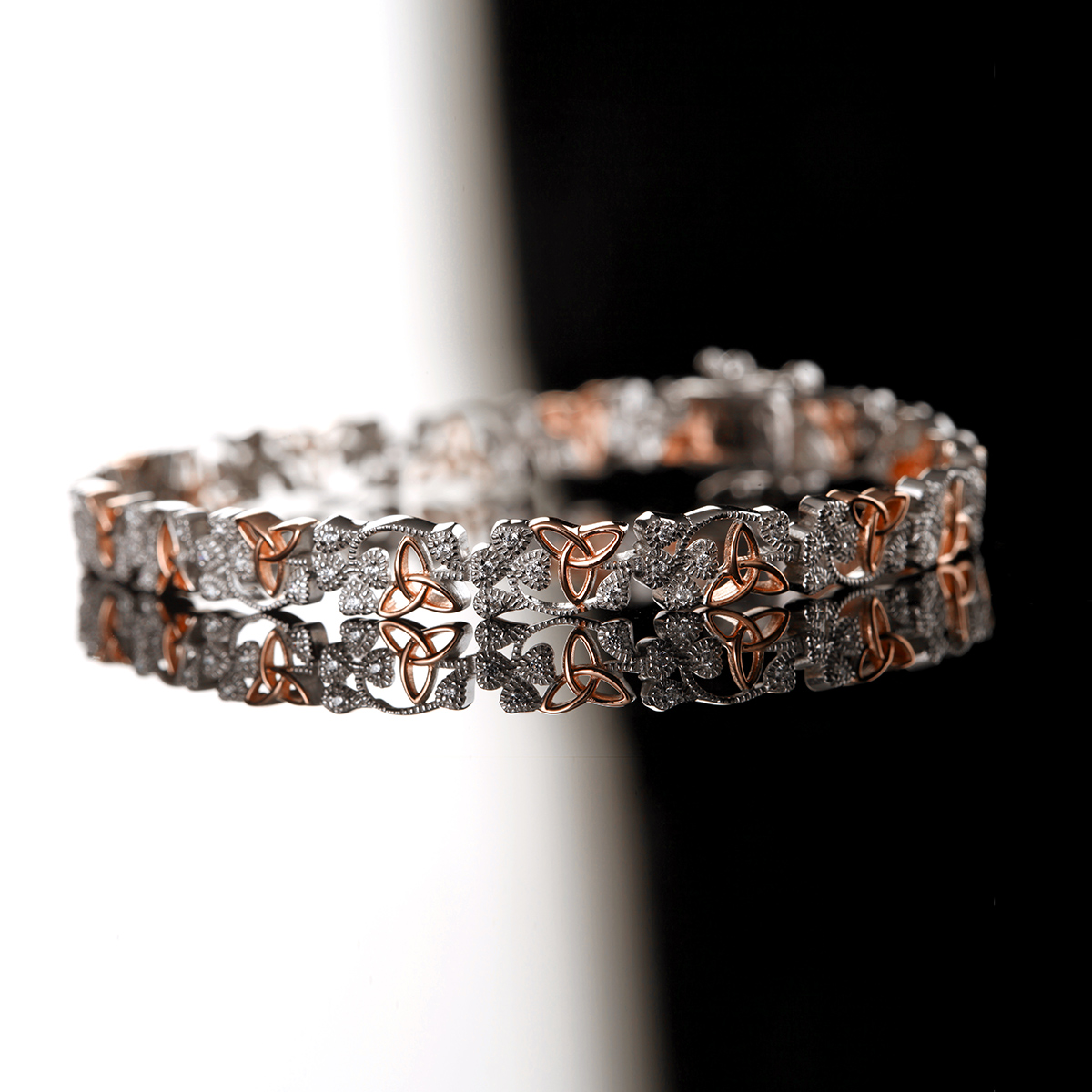 armband-shamrock-trinity-triskele-kleeblatt-irland-008FG7395hKbcQdv Crystal Trinity Shamrock - Keltisches Armband aus Irland - Silber mit Kristall & Rotgold